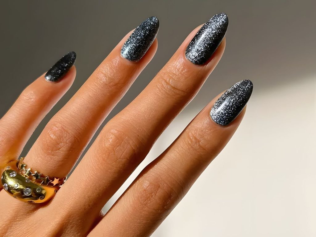 Explore 17 Black Glitter Nail Designs for a Chic Manicure